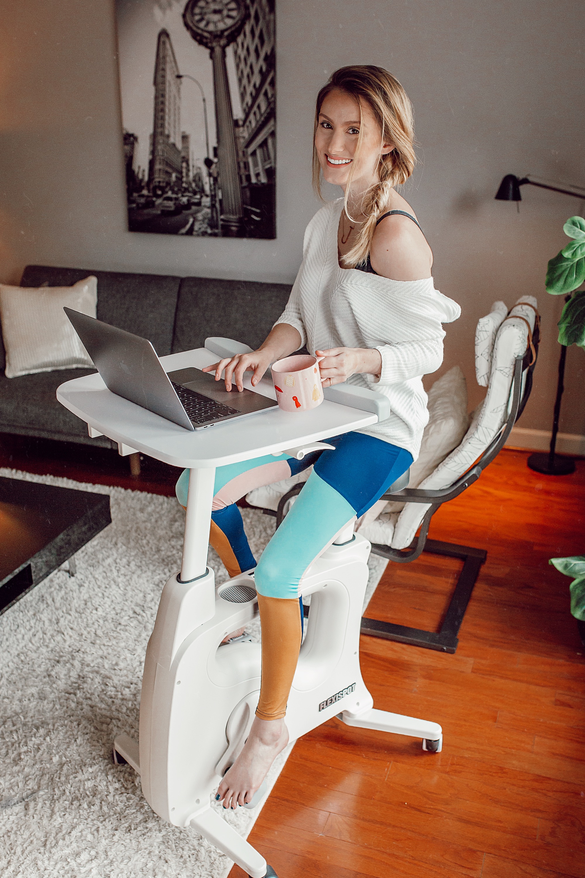 Flexispot desk bike. North Carolina fashion and lifestyle blogger Jessica Linn from Linn Style. Wearing Shein color block leggings.