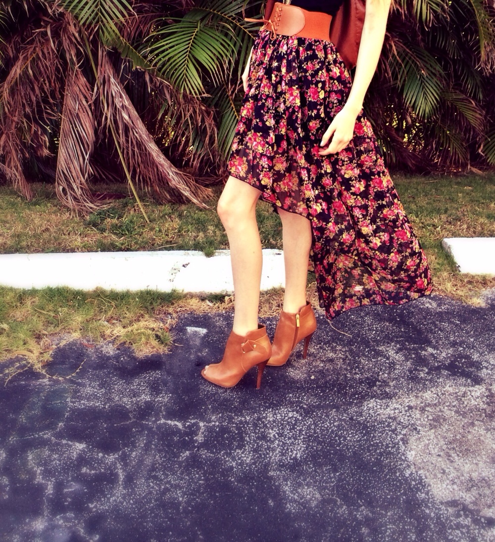  Fashion and lifestyle blogger Jessica Linn wearing a high-low skirt from Ross, peep toe heel boots by Guess, and staying at beaches in Florida.