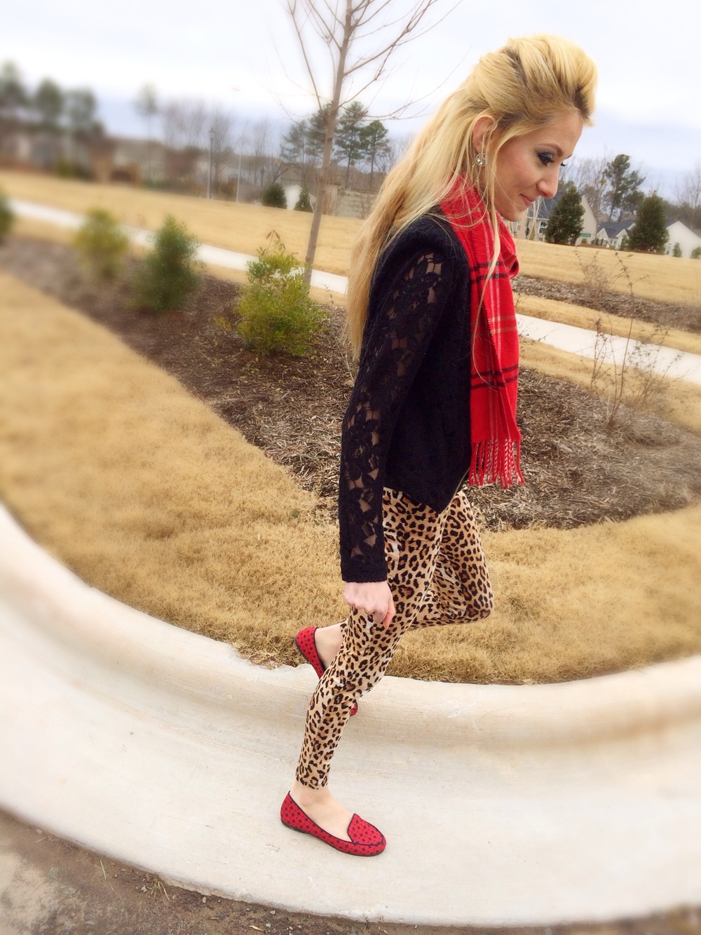 Leopard print and red plaid pattern mixing. By fashion and lifestyle blogger Jessica Linn.