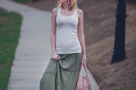 Jessica Linn from the lifestyle and fashion blog Linn Style wearing a green maxi skirt from Target, and tan tank top from Target, Baublebar earrings, a Kendra Scott bracelet, Charming Charlie sunglasses and carrying a Matt and Nat purse. 17 weeks pregnant maternity pregnancy clothes and style.