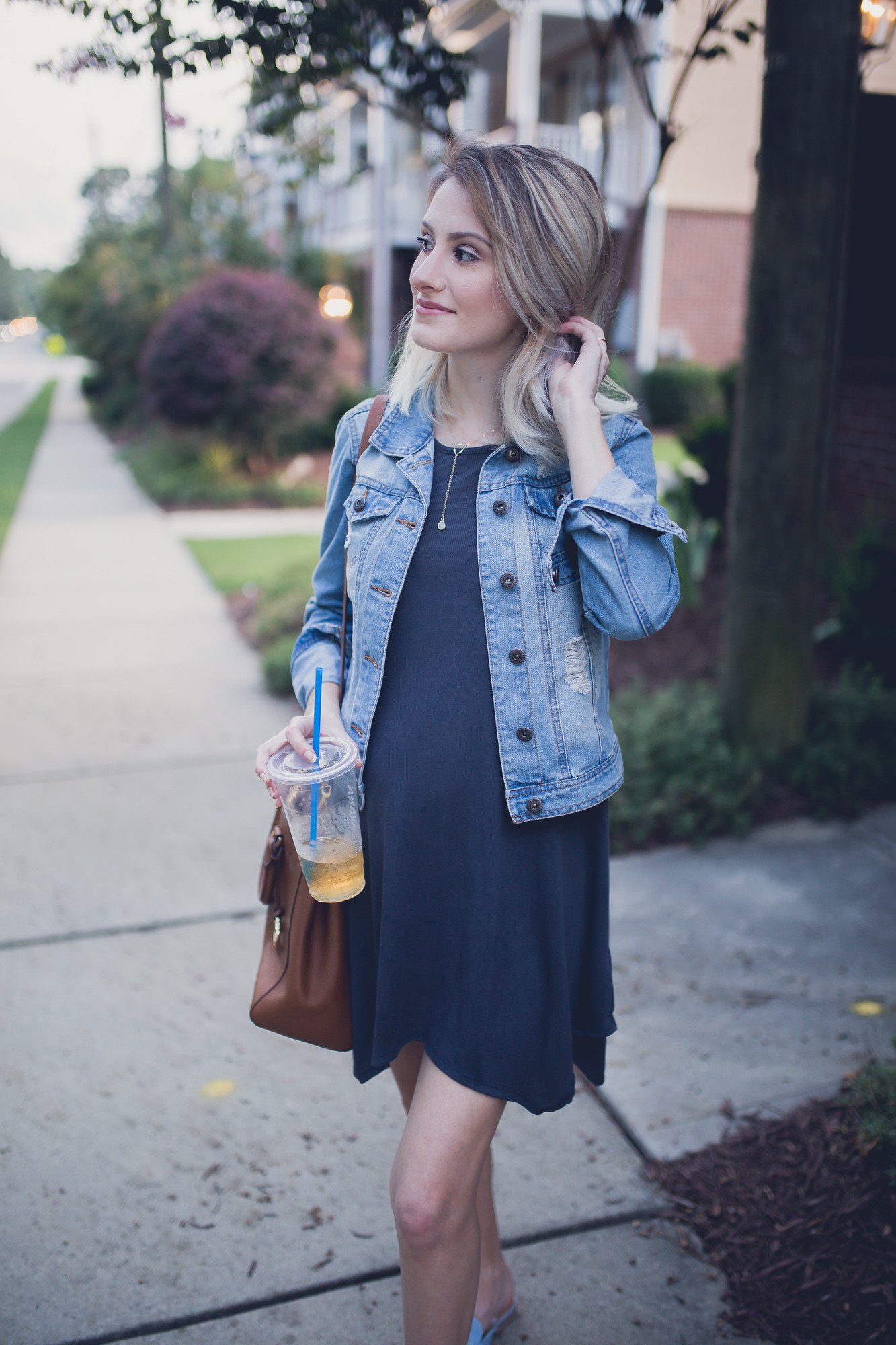 Lifestyle, fashion, and beauty blogger and vlogger Jessica Linn from Linn Style wearing a Forever21 t-shirt dress, and pair of blue shoes with embroidered florals and a denim jacket from Highway Jeans from Ross. Pregnant Maternity