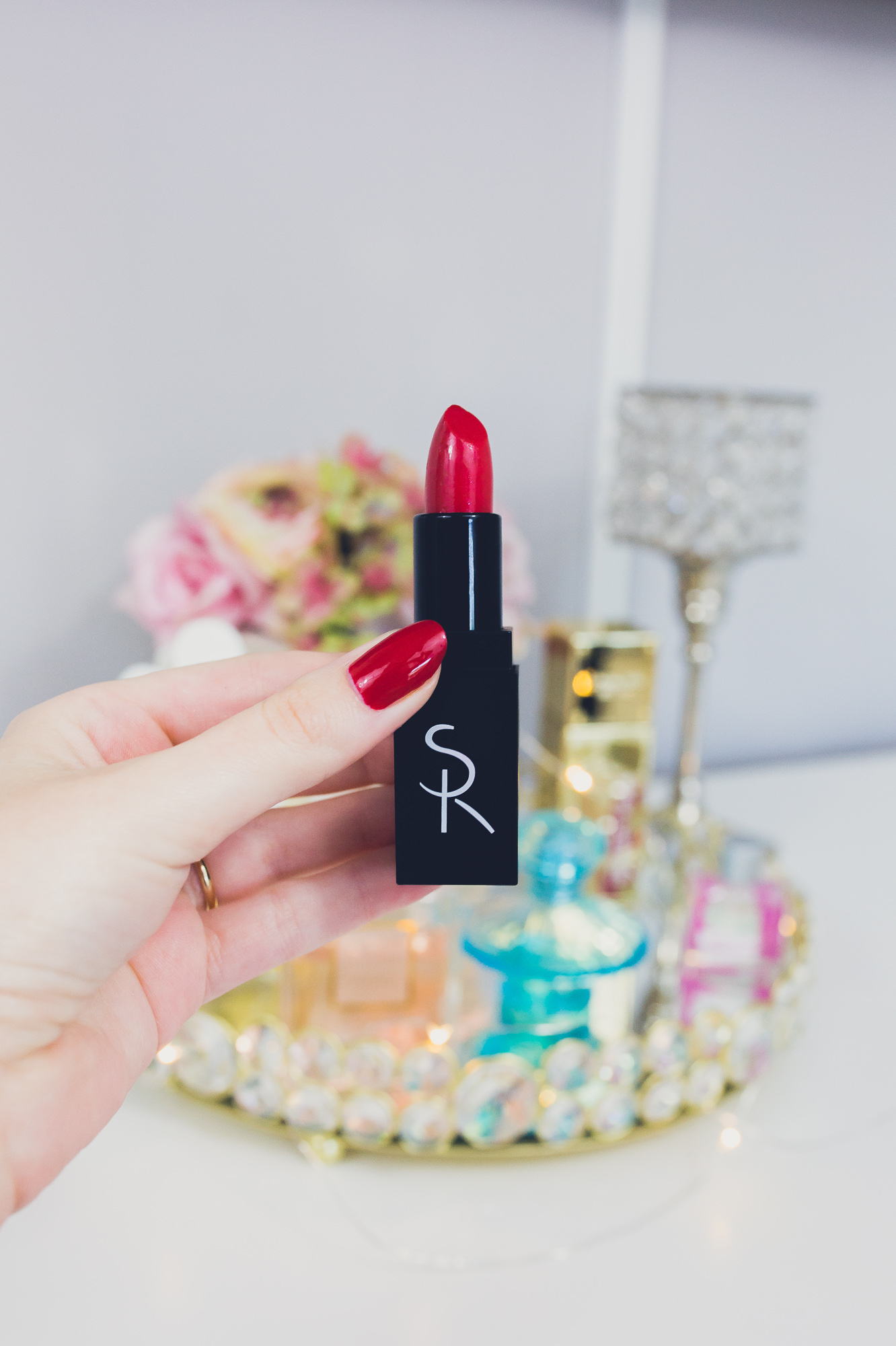 Lifestyle, fashion, and beauty blogger and vlogger Jessica Linn from Linn Style collaborating with SummerReign Cosmetics, a local Durham North Carolina lipstick company started by Ashley Summerville using all natural organic ingredients. Red Lipstick the color Crave.