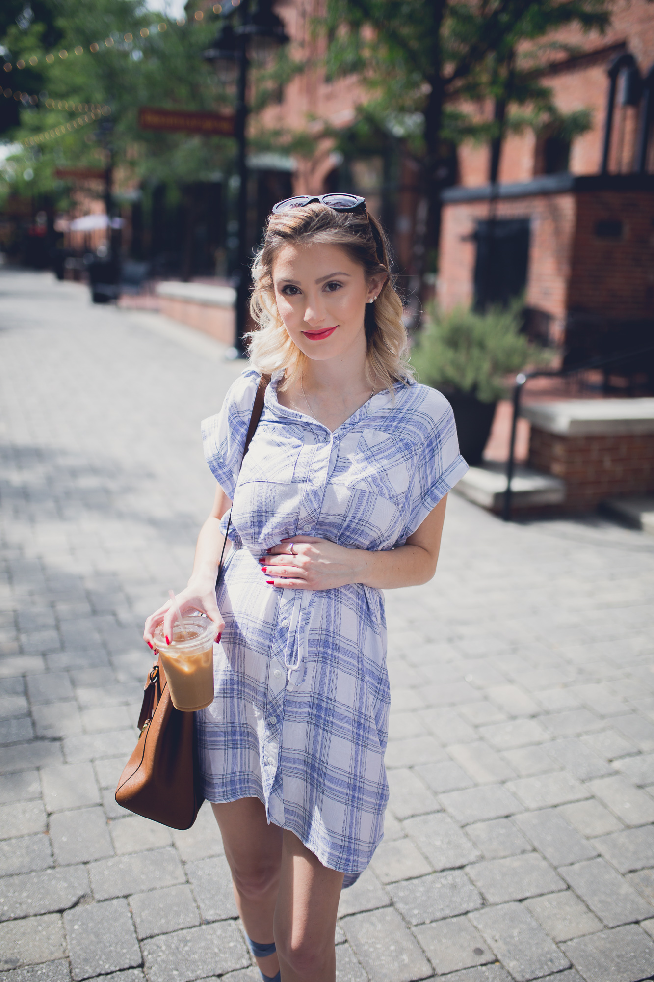 Fashion, lifestyle, and beauty blogger/ vlogger Jessica Linn on Linn Style wearing a blue and white plaid button up t-shirt dress from Ross, lace up blue sandals from Report footwear, and jewelry from local Cary North Carolina business CY Design Studio and lipstick from locally made all natural organic lipstick from SumerReign Cosmetics by Ashley Summerville in Durham NC.