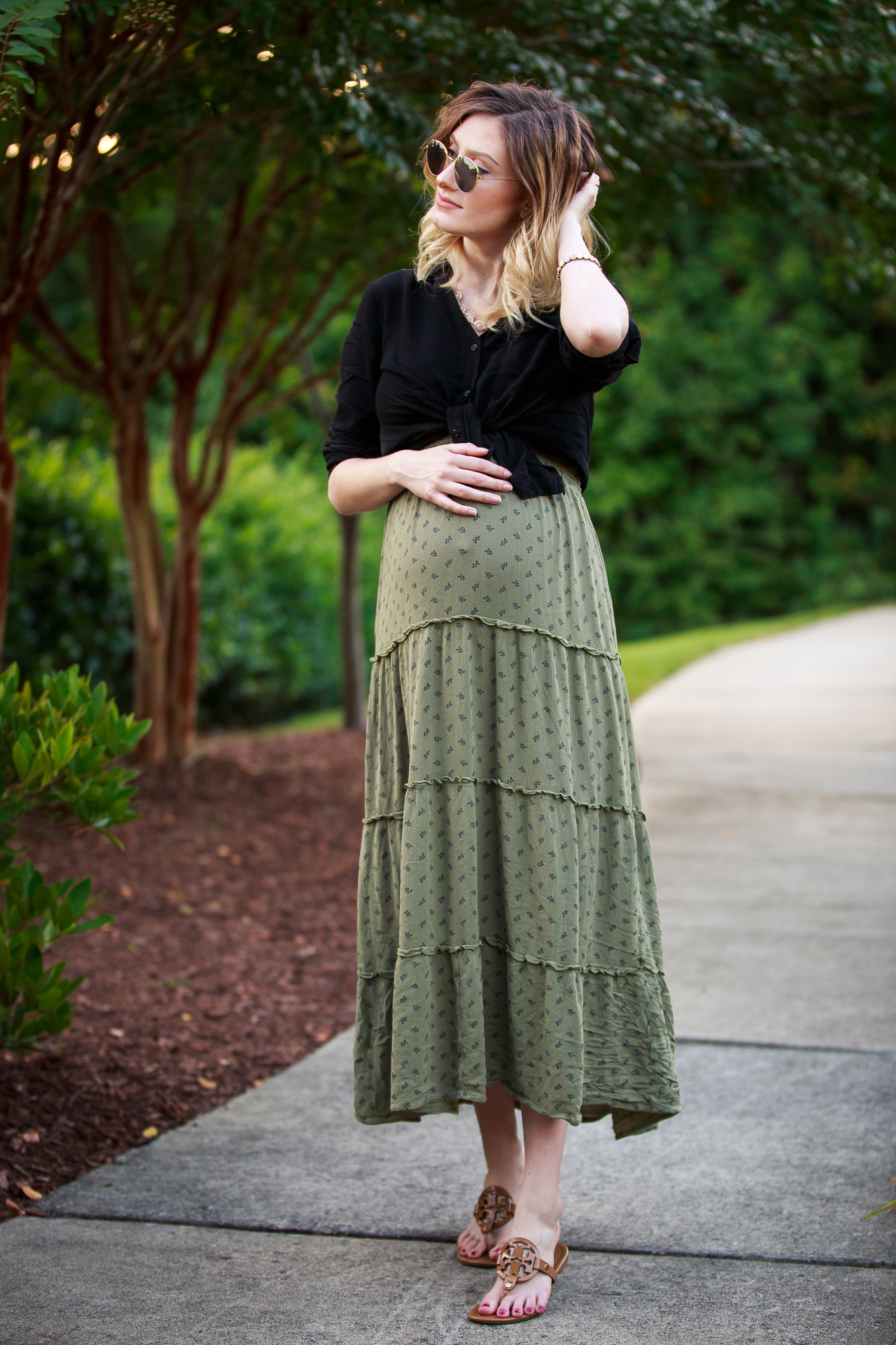 Maternity Style outfit inspiration by North Carolina fashion and lifestyle blogger Jessica Linn from Linn Style. Olive green maxi dress from Target, black button up blouse from Forever21, Necklace from Francesca's, and Tory Burch sandals
