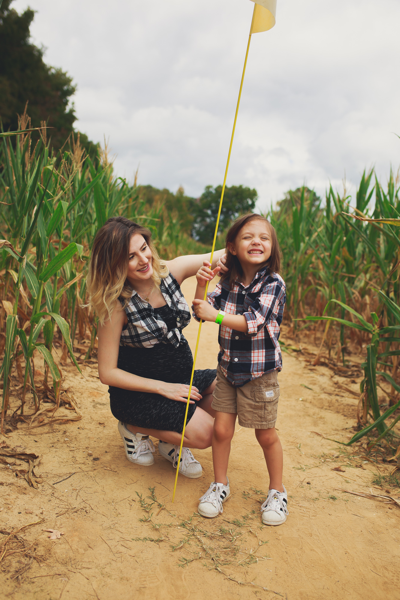 Lifestyle and fashion blogger Jessica Linn from Linn Style | Lifestyle post at Phillips farm in Cary North Carolina. Wearing a maternity dress from Target, flannel and Adidas. Fall Activities