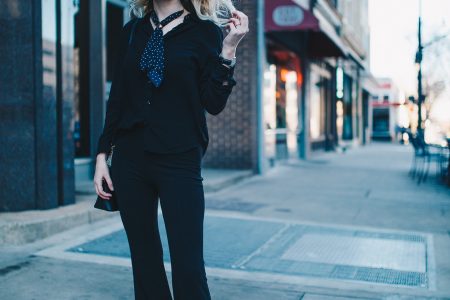 North Carolina fashion and lifestyle blogger Jessica Linn wearing a black button up blouse and black pintucked flare pants from Forever21, a neckerchief from Romwe, sunglasses from Francescas, thrifted green pointy toe heels, and a Welly Merck watch.
