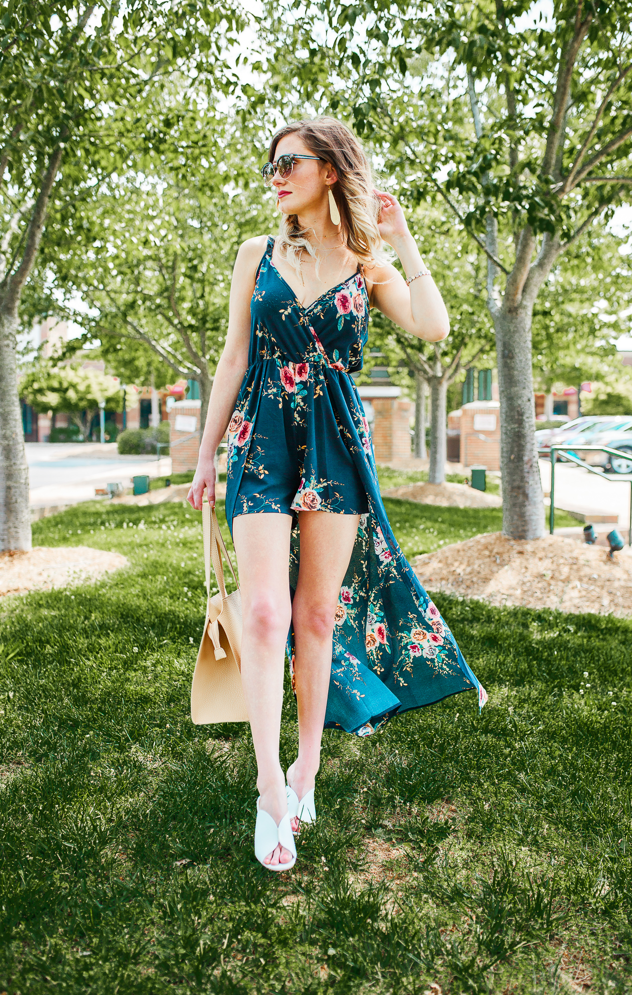  Romper Maxi Dress Combination is the perfect way to dress up during the summer! This summer / spring outfit captures the romper trend, as well as the chunky heel mule trend. North Carolina fashion and lifestyle blogger Jessica Linn is wearing a romper maxi dress from Copper Bloom, a nude purse by Universal Thread from Target, white chunky heel mules by Who What Wear from Target, gold leather statement earrings from RSA Studios, and a layered choker necklace from sugar fix Baublebar.