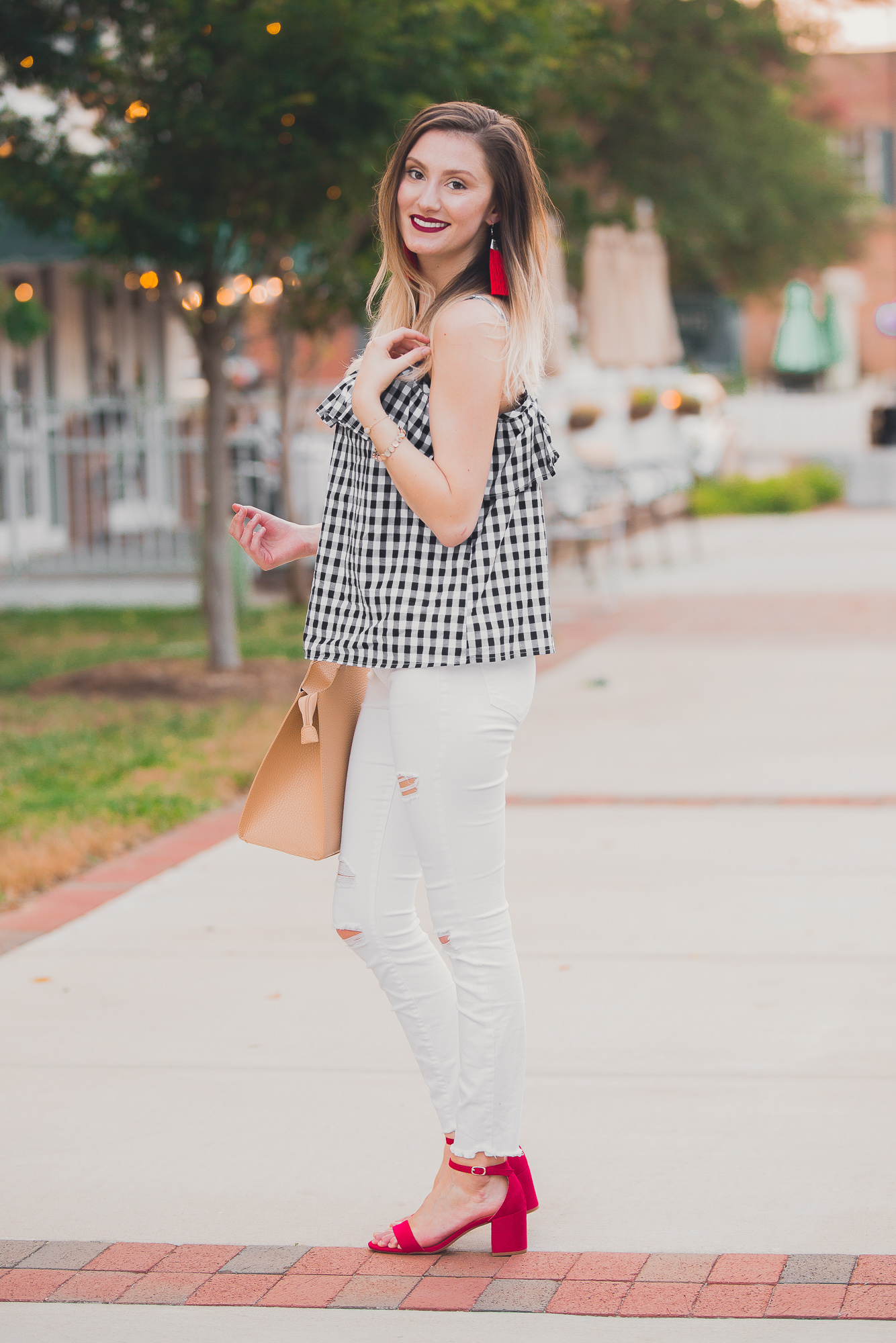 Gingham ruffle cami from Target, white denim, an da pop of red heels and earrings. Affordable summer fashion by popular North Carolina fashion blogger Jessica Linn from Linn style. North Carolina fashion bloggers