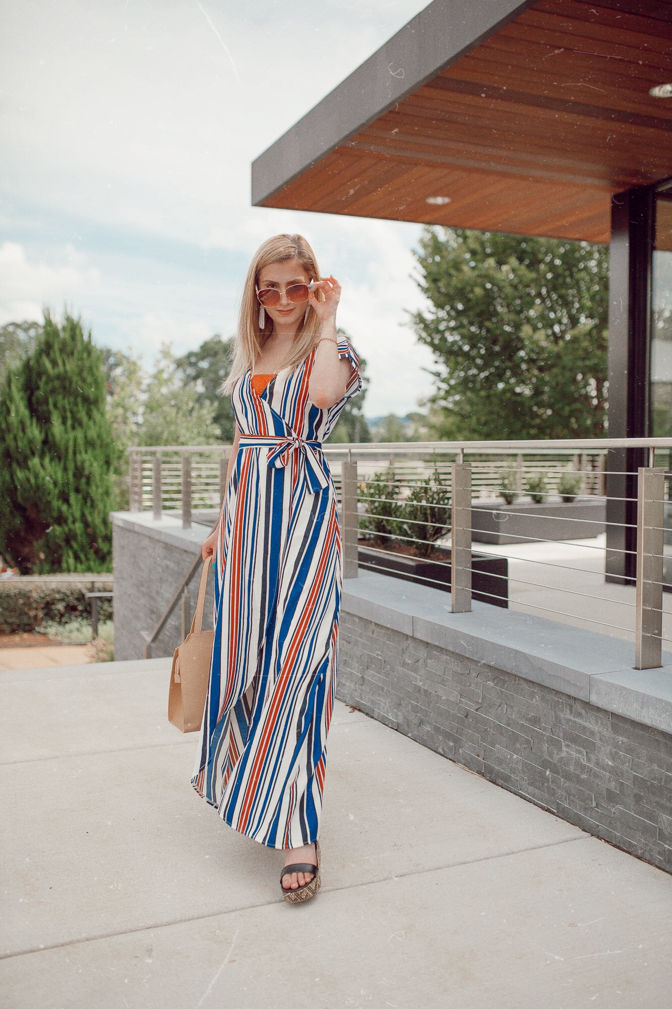 North Carolina fashion and lifestyle blogger Jessica Linn wearing a striped maxi wrap dress from Sugarhigh clothing, and platform sandals from Target.