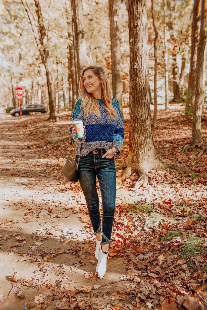 Jessica is wearing a Derek Lam 10 Crosby blue gradient knit sweater, American Eagle Next Level Super High-Waisted Jegging Crop, A New Day White Dominque Kitten heel Booties from Target.