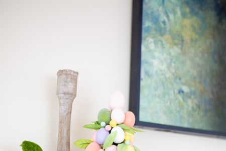 Simple easter mantle decorations. Easter topiary and grass bunny from Target.