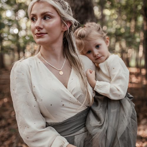Mother daughter photoshoot wearing Ivy City Co woodland fairy dress and Rellery jewelry